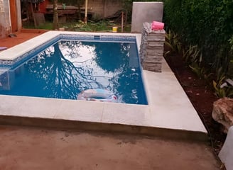 a pool with a pool and a pool in the background