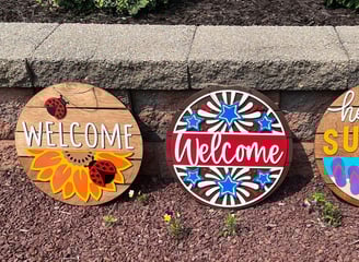 laser cut and colorfully painted wooden door or wall hangers