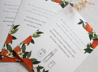 wedding suite cards for the gift bag with a candle olive old and some orange preserves