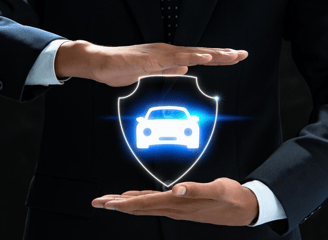 a man in a suit and tie holding a shield with a car icon