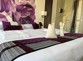 a bed with towels and towels on it