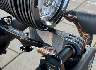 a bicycle with a light on it's side