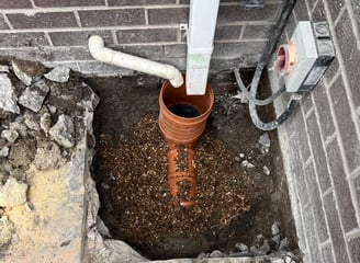 A gully in the middle of being installed in Warrington