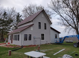 a house with new siding and new windows
