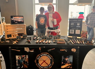 Jackson with Santa Claus at a Christmas craft fair