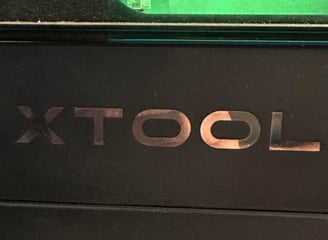 a close up of a black and green computer monitor