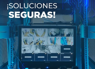 Monitor mostrando cámaras de seguridad con el texto “¡Soluciones Seguras!”.