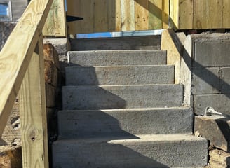 set of concrete stairs leading up to a backyard in Omaha nebraska