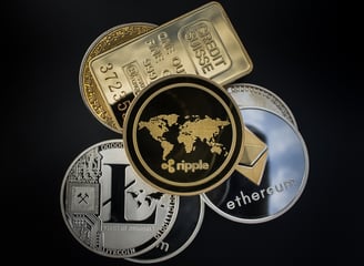 a bunch of coins with a world map on it