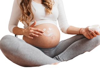Uma mulher grávida feliz depoisde receber informações para uma gravidez saudável.
