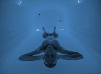 a man in a zero gravity floatation tub 