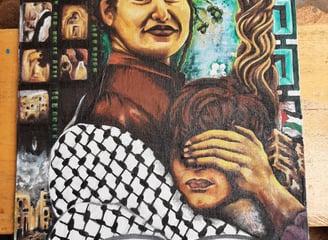 Painting of an activist holding a child protectively
