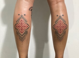 An handpoke tattoo featuring geomatric art ornaments songket melayu inspired, tattoo on legs