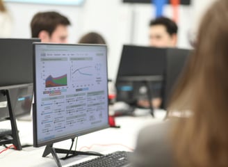 Executive reviewing company data and performance improvements built by Scardino Strategic Partners