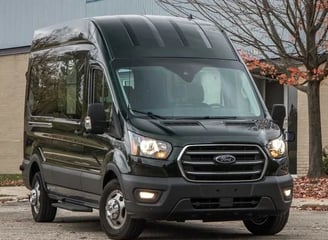 a black van parked in front of a building