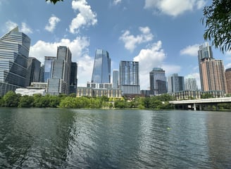 Numerous banks operate within the Austin downtown area skyline shown here from across town lake