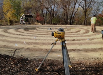 a man standing in a circular maze maze maze