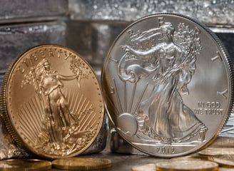 silver and gold US eagles