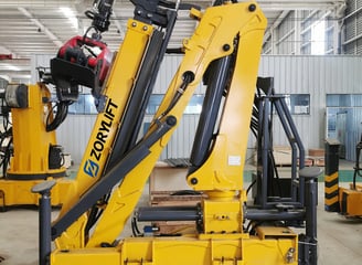 Finished Z-Fold Logging Cranes awaiting shipment.