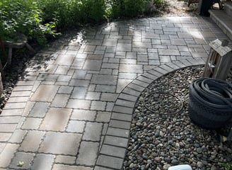 A clean paver walkway after being professionally power washed