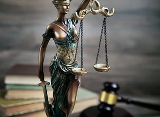 Statue of Lady Justice holding the scales 