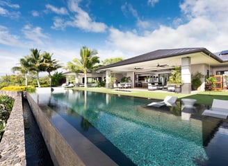 a pool with a view of a house