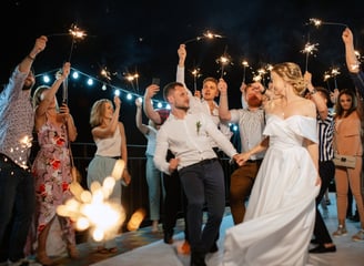 Wedding guests celebrating on dance floor with sparklers exit with Phoenix Arizona DJ Keo