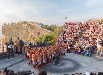 a group of people standing around a GWK Cultural Park