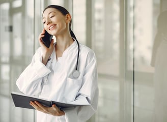 Doctor on phone with Medicare patient
