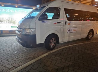 Modern 14-seater maxi cab for reliable group travel