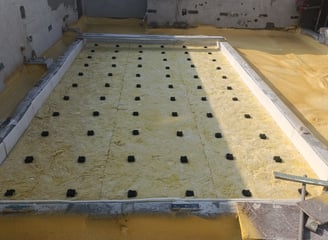 Floating floors installed for acoustic isolation in Dubai projects.