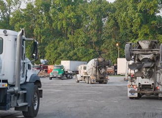 Multiple concrete trucks ready for pour concrete