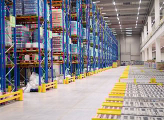 a warehouse with storage pallets