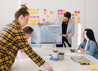 united media team discussing a brand development