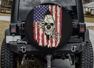 a jeep wrangling with a skull on it
