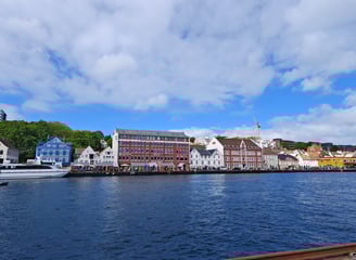 Lake with houses in background in Stavanger Norway