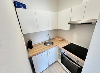 Kitchen with coffe machine and cooking space