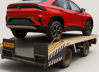 Zero degree Towing Vehicle carrying a Car to service center