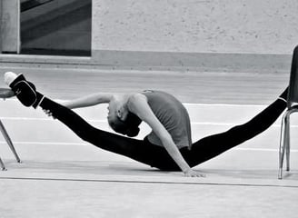 A perfect split from a rhythmic gymnast