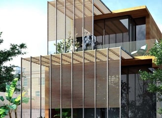 Celosía exterior metálica para protección visual y solar en fachada contemporánea con jardín frontal