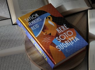 a book with a book on top of a table tennis carrie soto is back