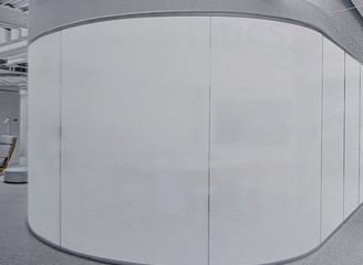 a modern office with a large window with Smart Film applied in off mode opaque