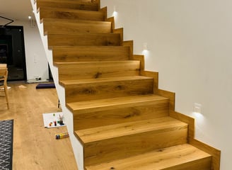a staircase casement with a wooden staircase