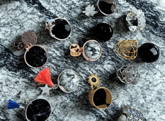 a bunch of rings and rings with a black and white background