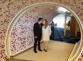 Zach and Kyrstin before their anniversary dinner in Wonderland on Harmony of The Seas