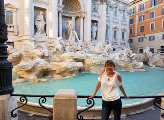 Lady Michelle poses by the Trevi Fountain in Rome, Italy