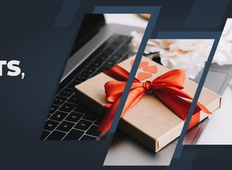 a laptop computer with a gift wrapped in red ribbon