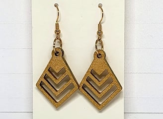 a pair of gold earrings with gold findings