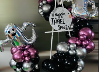Personalised welcome easel with balloons for hire in sussex
