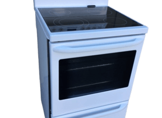 a white stove top oven with a white oven